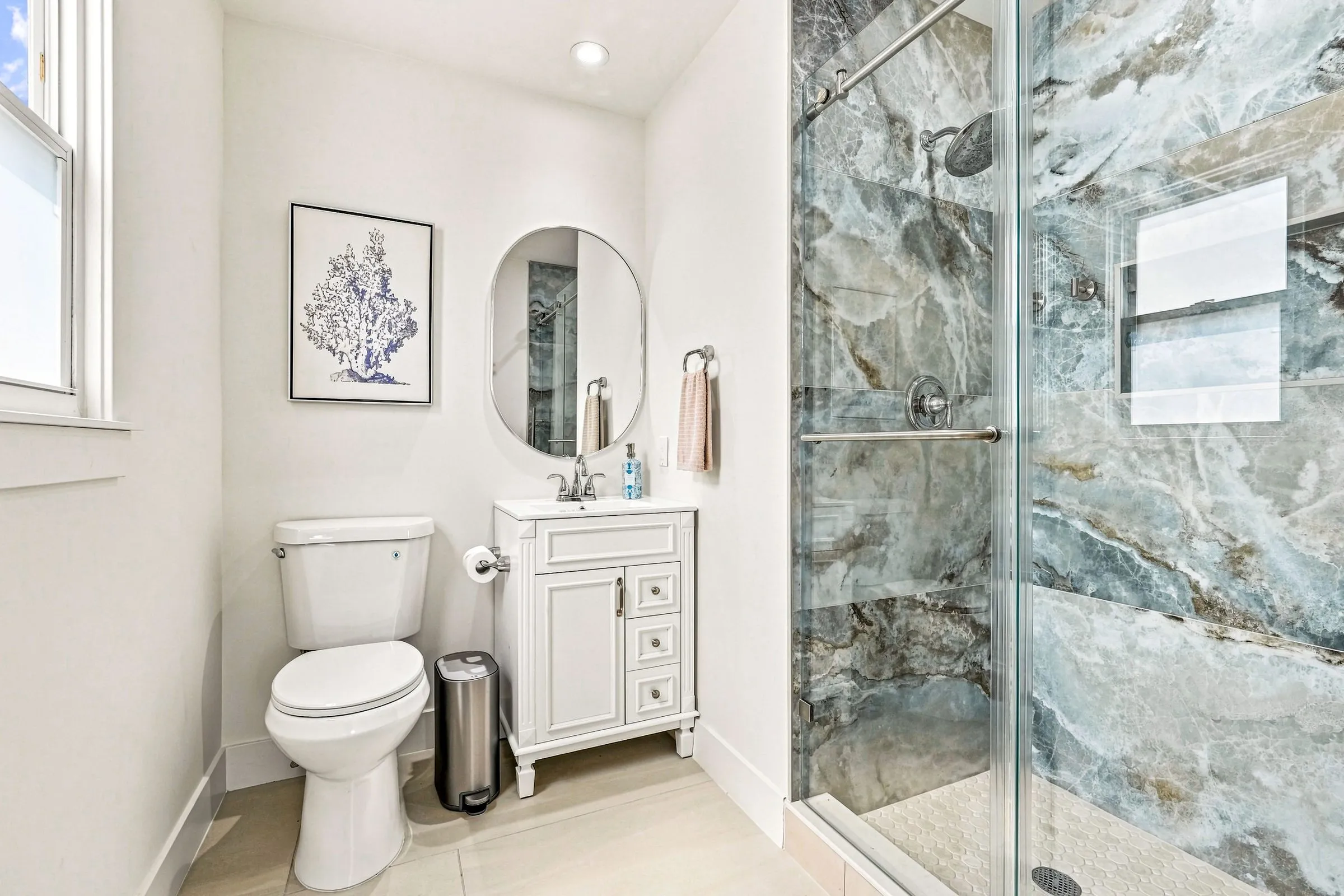 Primary bathroom with a walk-in glass shower